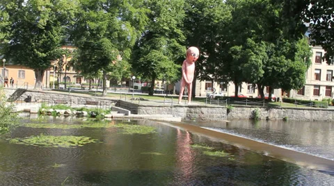 Taking leak in the river Stock Footage 27779438