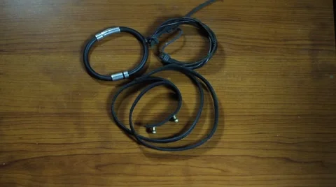 Taking leather bracelets from the table. Stock Footage 65252194