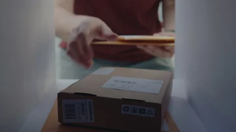 Taking Letters and Parcel out of the Mailbox Stock Footage 236983647