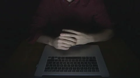 Taking marriage ring off in front of computer 2 Stock Footage 44352119