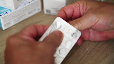 Taking medication. Stock Footage 337373433