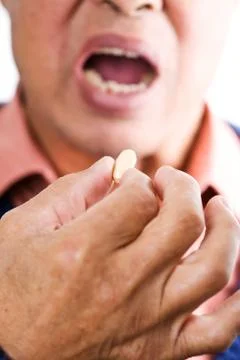 Taking medicine Stock Photos