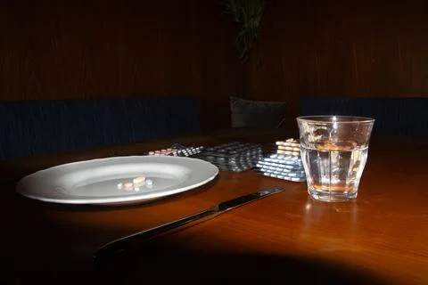 Taking medicines for breakfast Foto stock