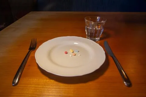 Taking medicines for breakfast Foto stock
