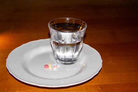 Taking medicines for breakfast Stock Photos