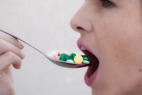Taking medicines Stock Photos