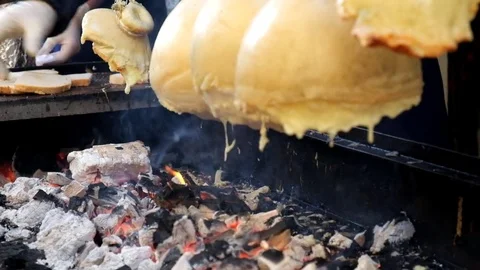 Taking melted cheese on barbeque Stock Footage 81597580