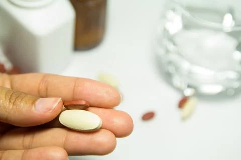 Taking natural supplements Stock Photos