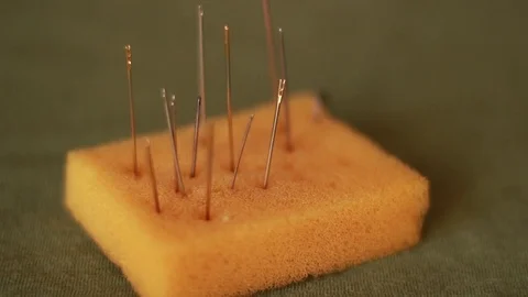 Taking a needle from a needle pillow 動画素材 73506195