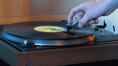 Taking the needle of record player Stock Footage 94719935