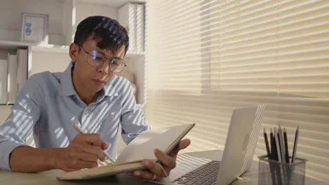 Taking note, Man's Hand Writing an Important Message in Notebook - Communicat Stock Footage 263463547