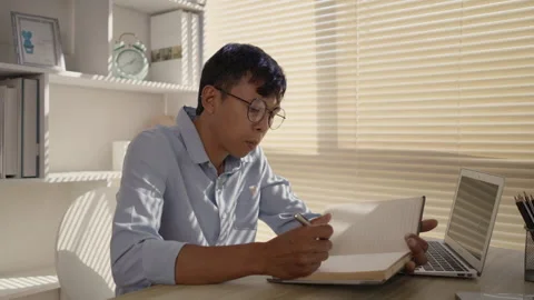 Taking note, Man's Hand Writing an Important Message in Notebook - Communicat Stock Footage 263464209