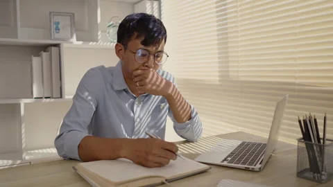 Taking note, Man's Hand Writing an Important Message in Notebook - Communicat Stock Footage 263466689