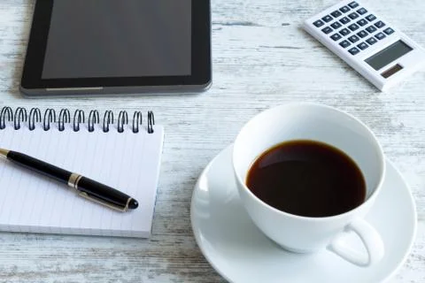 Taking notes and using the tablet Stock Photos