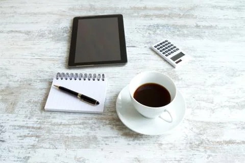 Taking notes and using the tablet Stock Photos