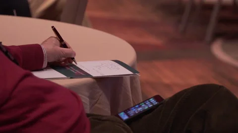 Taking notes at a conference Stock Footage 62415807
