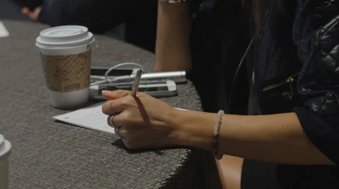 Taking notes in a meeting Stock Footage 56867061