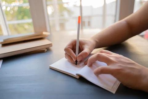 Taking notes notebook Stock Photos