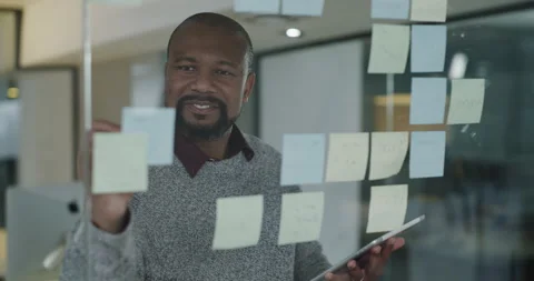 Taking notes from the past, creating scribbles of my future. 4k footage of a Stock Footage 201112391