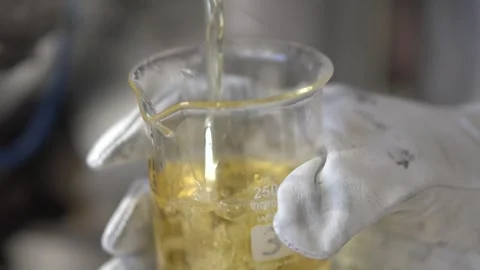 Taking oil sample for analysis Stock Footage 274431292