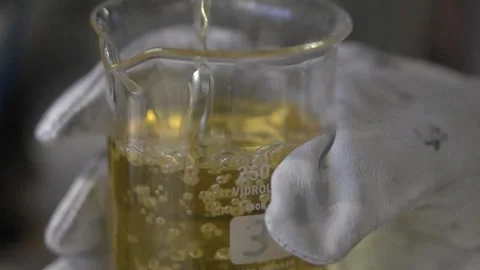 Taking oil sample for analysis Stock Footage 274431304