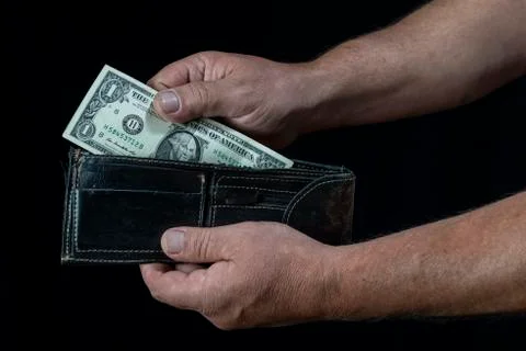 Taking one dollar Stock Photos