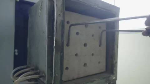 Taking out Brick from Factory Machine  Stock Footage 322114946