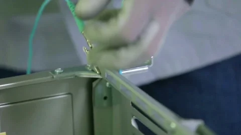 Taking out cables from a device Stock Footage 75373182