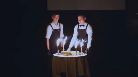 Taking out a cake with fireworks, a cake with a cold fountain Stock Footage 205064182