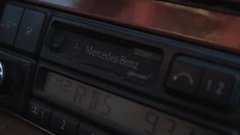 Taking out a cassette inside a car player  recorder for an old Mercedes 4K Stock Footage 162024833
