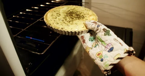 Taking out Cheese Pie From the Oven in The Kitchen, Cooking Meal Stock Footage 242441092