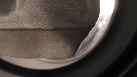 Taking out Clothes from washing machine Stock Footage 128201767