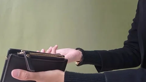 Taking out the coins on the wallet Stock Footage 150665697