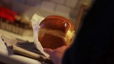Taking Out Fresh Made Bread Out Of The Baking Pan, Night Time Home Kitchen, 4K Stock Footage 237214533