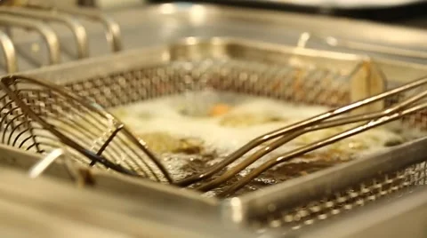 Taking out a Fried Fish from Deep Oil Stock Footage 49500326