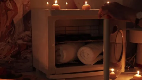 Taking Out the Massage Stones from a Heater Video stock 300485853