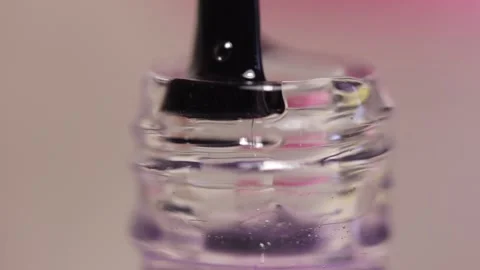 Taking out nail brush from bottle with nail polish Видео 149123210