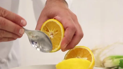 Taking out orange seeds Stock Footage 46531548