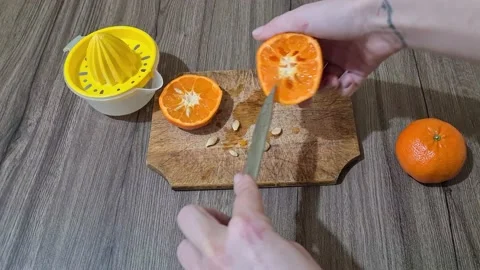  Taking Out Orange Seeds  Stock Footage 152650670