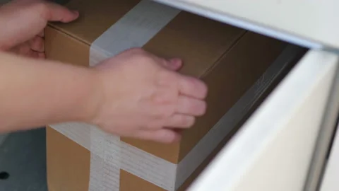 Taking out a parcel from a parcel locker in 4k slow motion 60fps Stock Footage 155900868