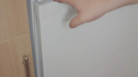 Taking Out A Plastic Tupperware Box From A Fridge Stock Footage 95681389