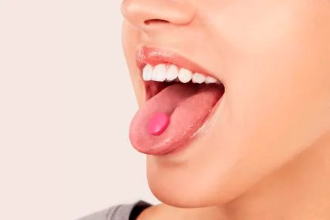 Taking painkiller. Stock Photos