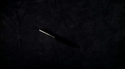 Taking pencile from a table Stock Footage 10606996