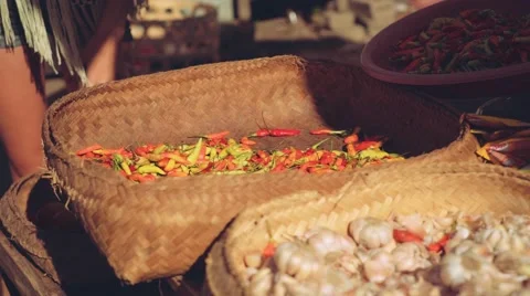 Taking pepper from wicker basket, close up slide Stock Footage 68061169