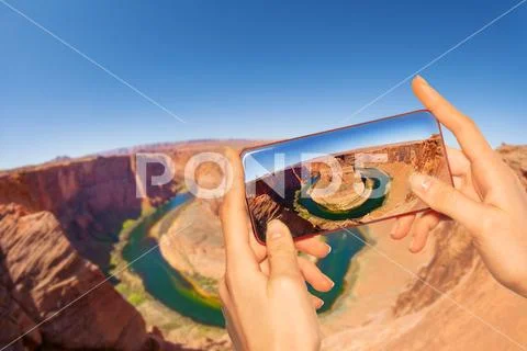 Taking photo of canyon horse shoe in USA Utah Stock Photos