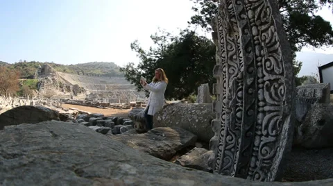 Taking photo with digital tablet in ruins ancient Ephesus Stock Footage 34808742