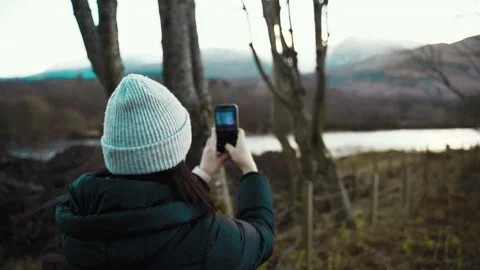 Taking photo mountains river Stock Footage 167668593