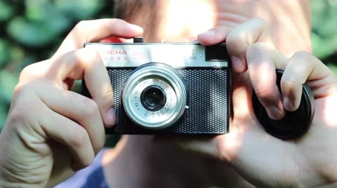 Taking photo with old camera Stock Footage 65253391