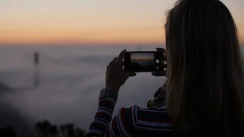 Taking Photos In The Clouds Stock Footage 97696895
