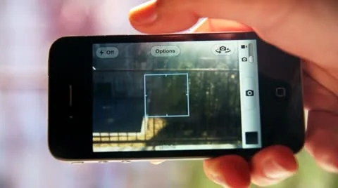 Taking Picture With iPhone Video stock 10852258